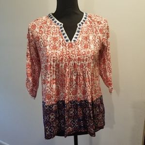 Patterned orange and navy blue blouse w 3/4 sleeve